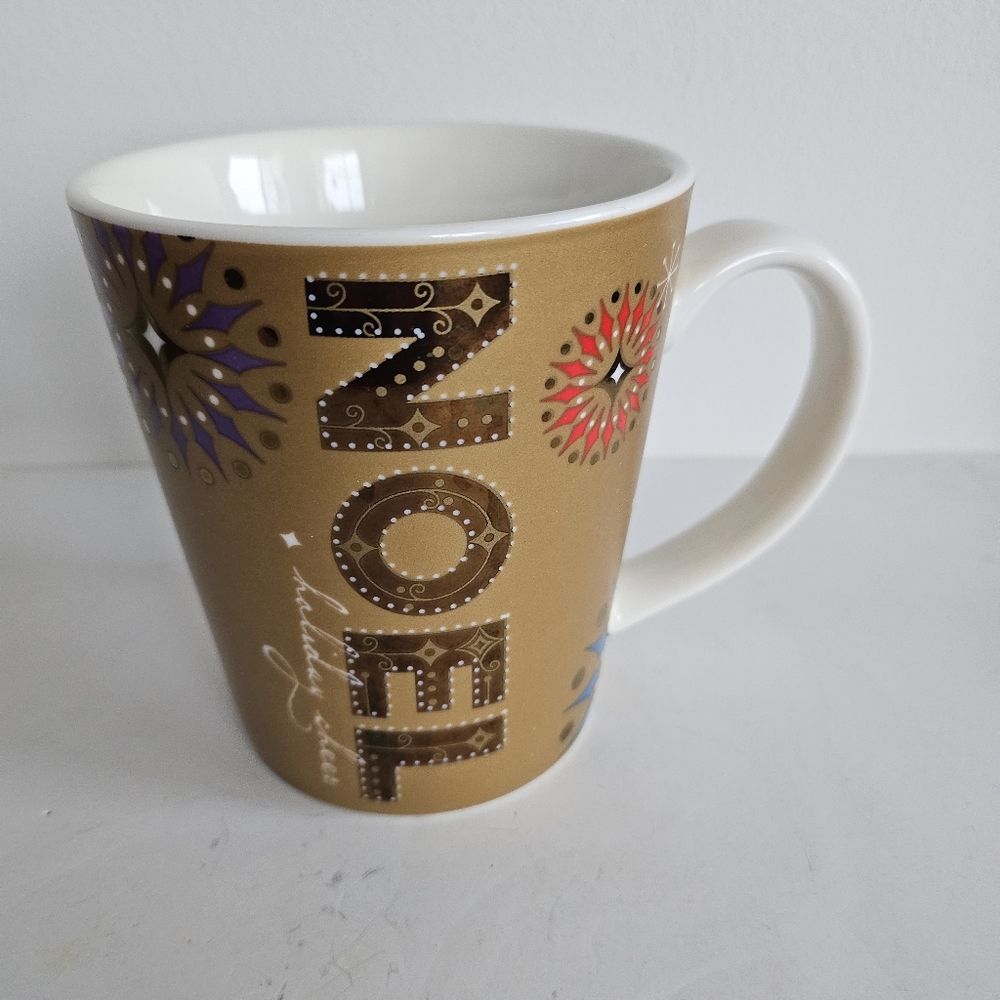Starbucks Gold Noel Holiday Cheer 2006 coffee mug 14oz. Christmas eggnog